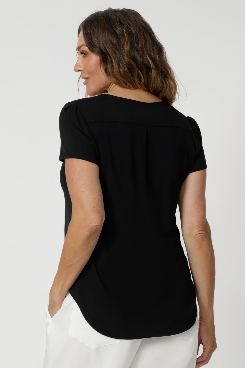 Available in sizes 8-24, this top is designed to flatter a variety of body types, providing a sleek silhouette while ensuring comfort. It comes in five different colorways, giving you the option to choose your perfect hue for all your summer dressing needs. Leina & Fleur stock this Sawyer Top in sizes 8-24.