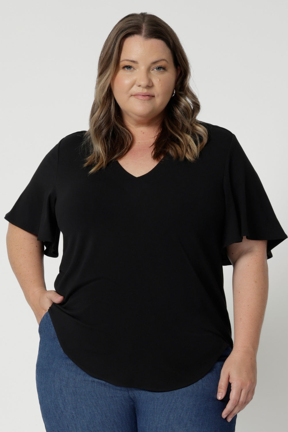 Perfect for travel, the top is lightweight, wrinkle-resistant, and easy to pack, making it a great companion for any getaway. Whether you're pairing it with jeans for a casual day out or dressing it up with a skirt and heels for a night out, this top offers endless styling possibilities.