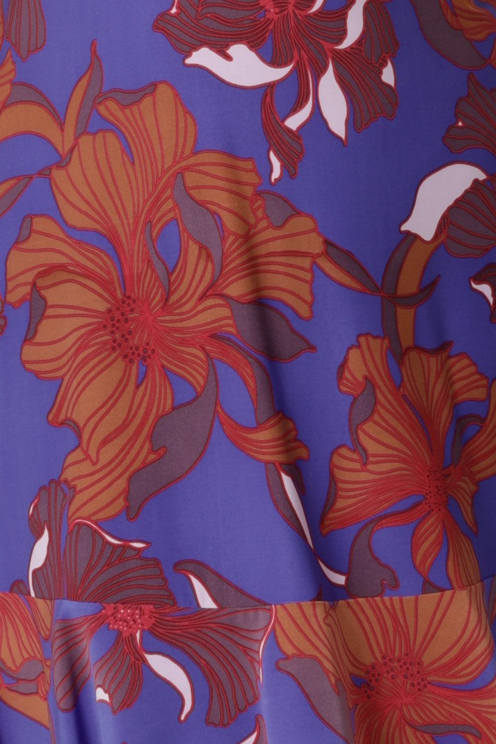 Red Hibiscus print designed to make this flutter sleeve dress with a twist front bodice is on a blue soft-touch jersey base with print details in red, taupe, clay and soft lilac. The fabric has a soft stretch.
Stocked in 8-24 by woman's clothing brand Leina & Fleur.