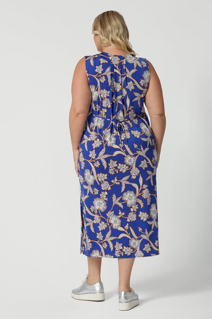 Back view of sleeveless floral print dress in slinky jersey fabric, perfect for off-duty summer styling. Made in Australia by Australian and New Zealand women's clothing brand, Leina & Fleur. This plus size midi-length empire line dress is available in sizes 8 to 24.