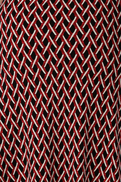 A swatch of red, vanilla and black 'Chevron' print fabric used by Australian fashion brand, Leina & Fleur to make women's work jackets, tops and pants.