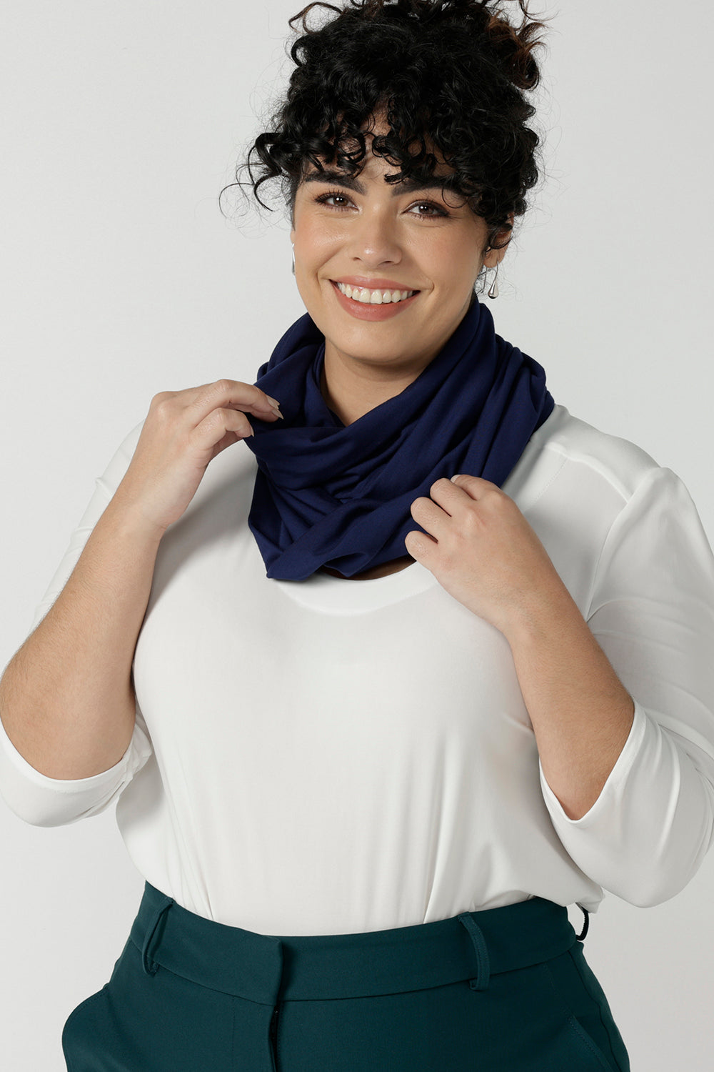 Woman wears bamboo fibre desiree scarf in french navy. Comfortable and heat regulating bamboo. Made in Australia style for women size 8 - 24.