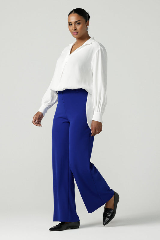 The Drew Pant in Cobalt Scuba Crepe with a wide leg Cobalt pant with a high waist that can be worn with the matching Blazer. Comfortable and easy care suit set for women. Size 8-24.