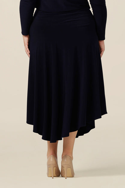 Back view of a pull-on skirt with asymmetric, midi-length hem. Made in Australia, shop online in an inclusive 8 to 24 size range.
