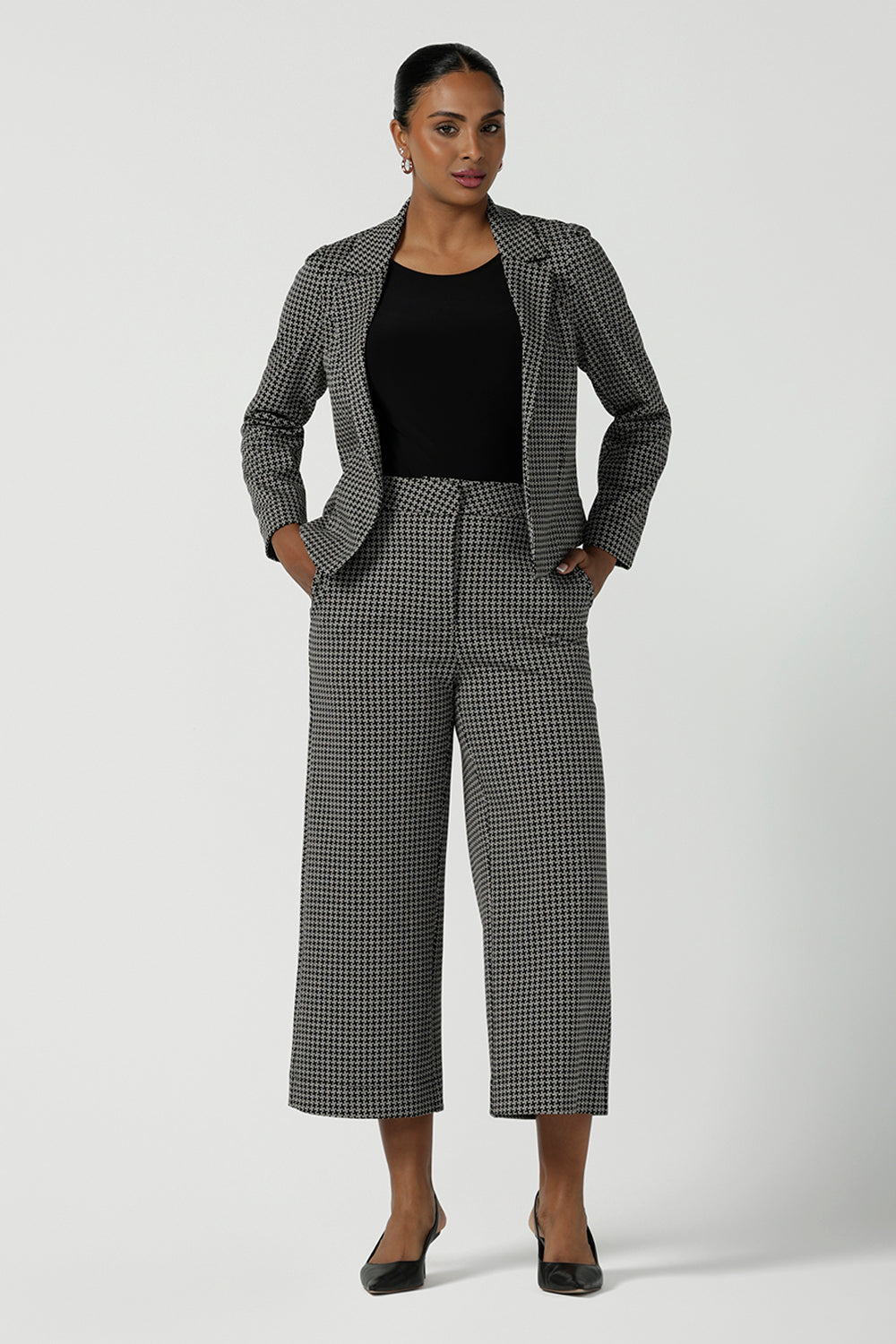 A size 10 woman wears the Raleigh in Jacquard. Styled back with the Yael Pant in Jacquard. A textured ponte suit set. Made in Australia  for women size 8-24. 