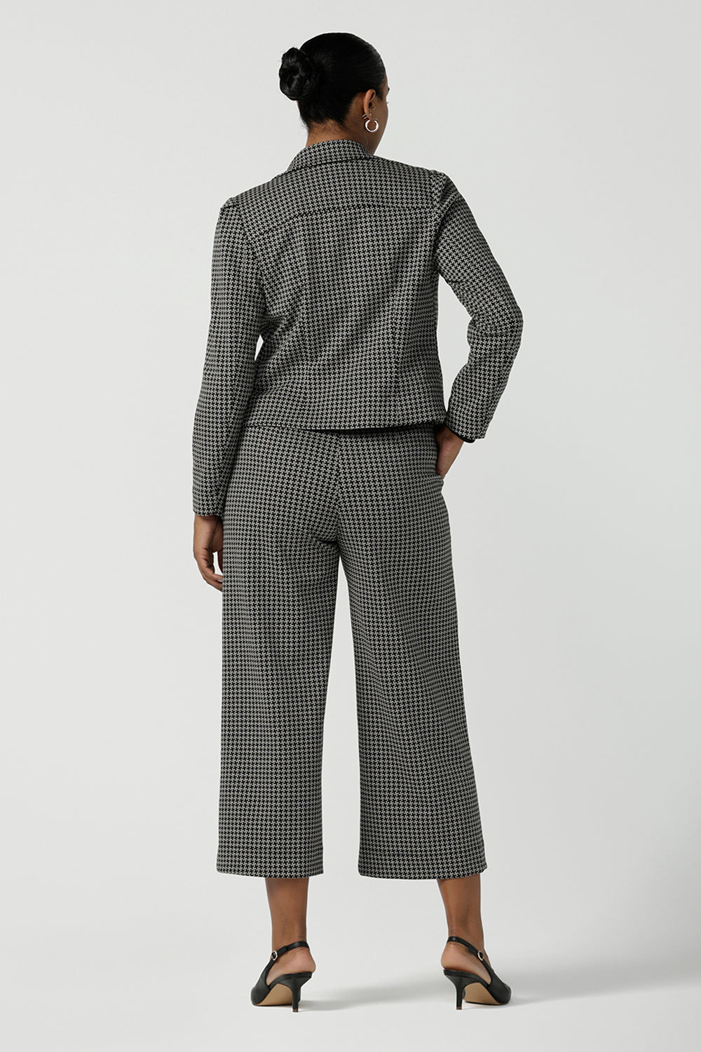 Back view of a size 10 woman wears the Raleigh in Jacquard. Styled back with the Yael Pant in Jacquard. A textured ponte suit set. Made in Australia for women size 8-24