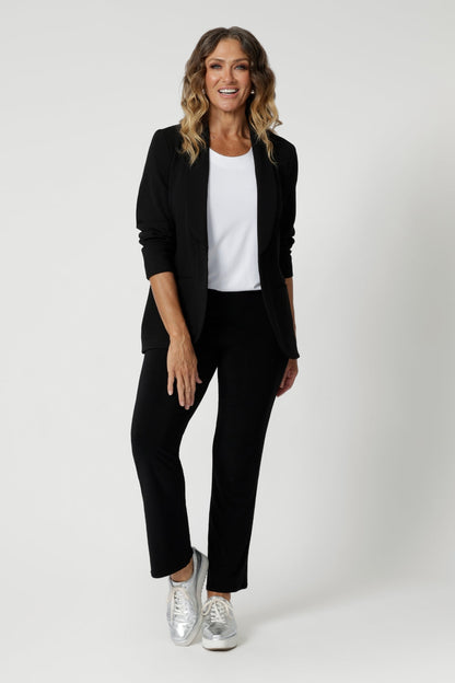 Size 12 model styles Sawyer Top in Vanilla with black fitted pants & black blazer for a stylish everyday look which could easily transend into the work place. This classic cut shirt is available in sizes 8-24 and can be purchased in 4 other colours for your summer wardrobe. 