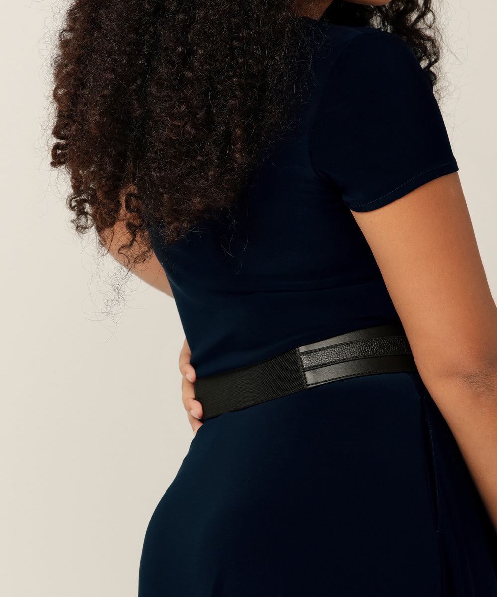 stretchy belt available in 9 sizes - black leather-look belt front for the waist with stretch material at the back for a comfortable fit
