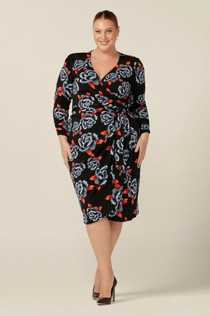 A long sleeve wrap dress with tulip skirt by Australian and New Zealand women's clothing label, L&F. Worn by a fuller figure woman, this jersey wrap dress is available in inclusive sizes, 8 to 24. 