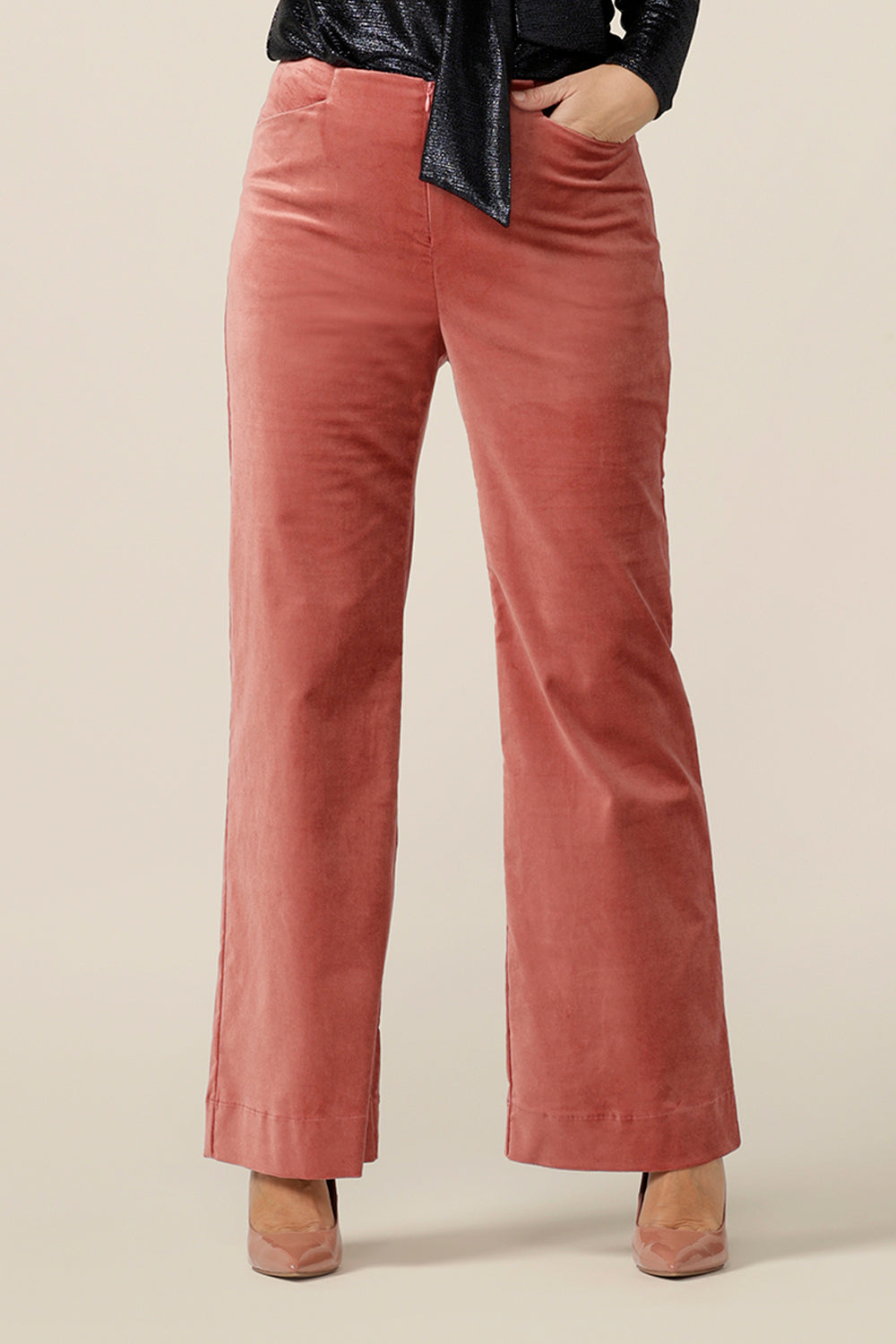 Evening and cocktail wear gets a touch of disco with these flared leg, tailored pants in musk pink velveteen. Made in Australia, these special event pants are designed by women's clothing and occasionwear brand, L&F in sizes 8 to 24, petite to plus sizes.