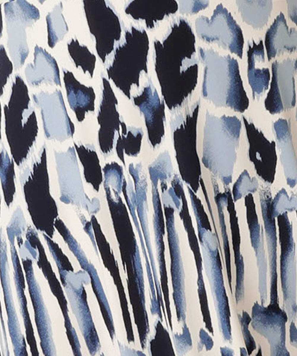 fabric swatch of Australian women's clothing brand, Leina & Fleur's blue and white Sumi print jersey fabric, used to create a collection of women's workwear.