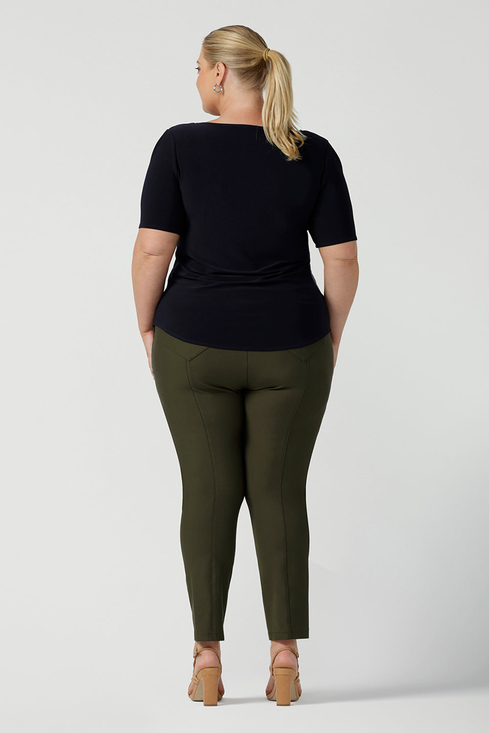 Back view of slim leg ponte pants for workwear. Curvy workwear for women, size inclusive 8-24 womens work pants. Olive green colour with cropped leg. Comfortable work pants.